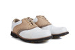 Pair of golf shoes on a white background