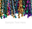 Mardi gras beads on white with copy space