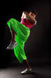 Hip hop woman dancer against black background