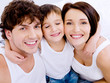 Happy cheerful mother and the father with son