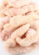 Pile of frozen chicken thighs close up Pile of frozen chicken thighs close up