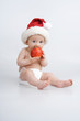 Infant with apple.