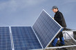 Workman assembling solar