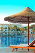 Chair near the swimming pool Chair near the swimming pool