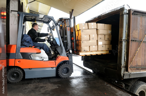Photo: Forklift in warehouse Forklift in warehouse