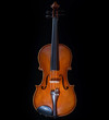 vintage violin over dark background vintage violin over dark background