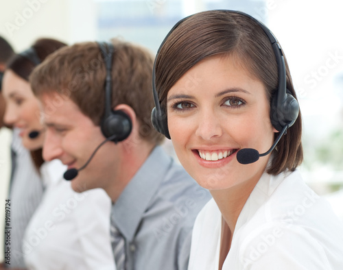 Photo: Female customer service agent in a call center Female customer service agent in a call center