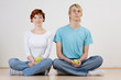 Couple sitting on floor