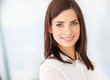 Photo: Closeup portrait of a pretty young brunette Closeup portrait of a pretty young brunette