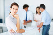 Portrait of a successful female magazine editor at work