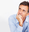 Mature business man looking away, lost in thoughts