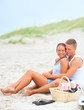 Young couple enjoying on the beach together