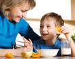 Happy mother and son in kitchen Happy mother and son in kitchen