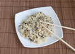 Brown rice with wild and Chinese chopsticks