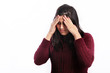 Woman suffering a migraine headache Woman suffering a migraine headache