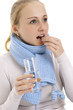 Woman taking a medicine.