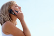 Young female enjoying a conversation over the mobile phone