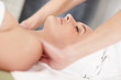 Female getting a massage by a masseuse at the spa