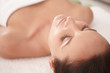 Relaxed young female at a dayspa