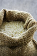 Long grain rice in burlap sack Long grain rice in burlap sack