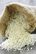 Long grain rice in burlap sack Long grain rice in burlap sack