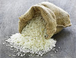 Long grain rice in burlap sack Long grain rice in burlap sack