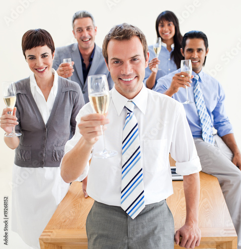 Foto : International business people toasting with Champagne International business people toasting with Champagne