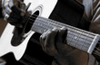 African American man playing guitar