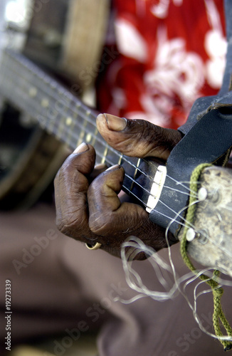 Photo: Man playing guitar Man playing guitar