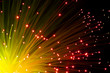 Photo en ligne au meilleur prix orange optic fibers on black background