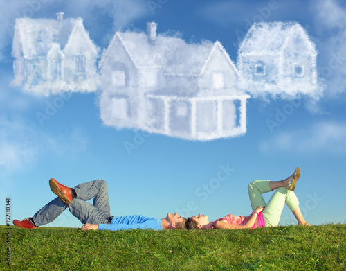 Photo: lying couple on grass and dream three cloud houses collage lying couple on grass and dream three cloud houses collage