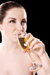 Young woman drinking champagne