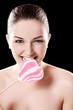 Woman with heart shaped lolly