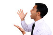 An expressive Indian male in a bewildered gesture.