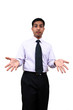 An expressive Indian male in a bewildered gesture.