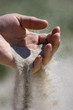 Sand rinnt durch die Hand Sand rinnt durch die Hand