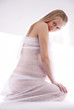 undressed pregnant female holding her breasts undressed pregnant female holding her breasts