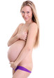 undressed pregnant female holding her breasts undressed pregnant female holding her breasts