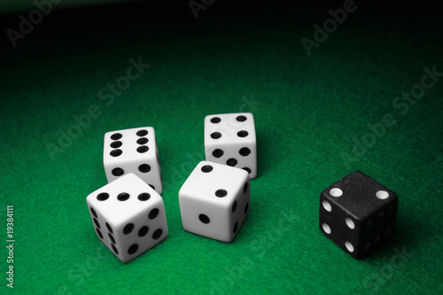 Photo: Seperated Dice over Green Seperated Dice over Green