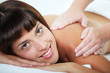 Close-up of a beautiful young woman getting a massage