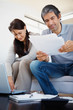 Image of mature couple planning their budget Image of mature couple planning their budget