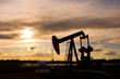 Pump Jack Silhouette at Sunset Pump Jack Silhouette at Sunset