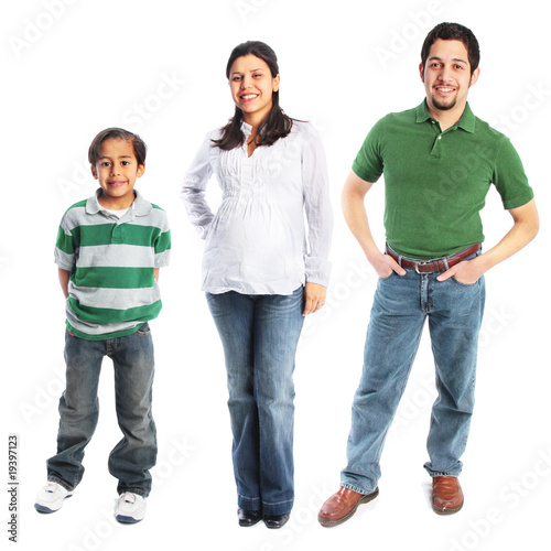 Photo: Family of three dressed in casual clothes isolated Family of three dressed in casual clothes isolated