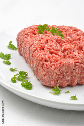 Photo: minced meat with parsley on a plate minced meat with parsley on a plate