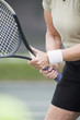 Senior woman playing tennis