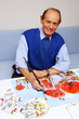Foto: Happy Senior Painting - Senior Maler Happy Senior Painting - Senior Maler