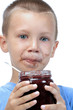 kid is eating marmelade