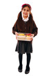 Photo: Schoolgirl holding healthy lunch box isolated over white Schoolgirl holding healthy lunch box isolated over white