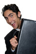 Businessman with black leathern case. Businessman with black leathern case.