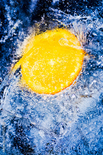 Photo: Fresh orange in cool water Fresh orange in cool water